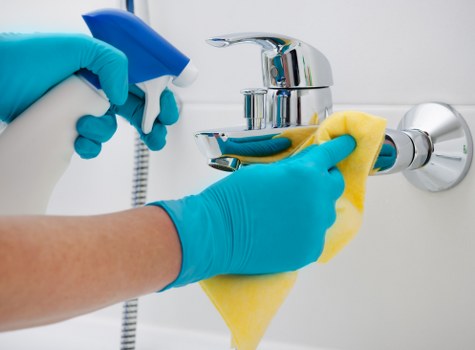 Step-by-step stain removal supplies on a table