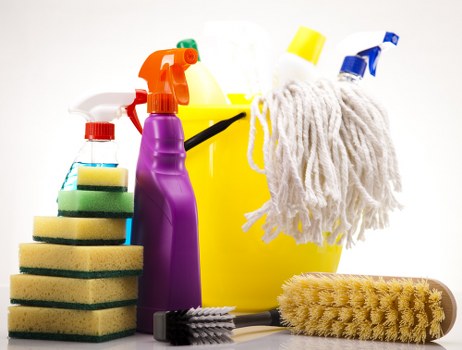 Technician performing commercial carpet cleaning on office flooring